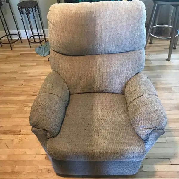 Before and after comparison of recliner armchair fabric upholstery cleaning.