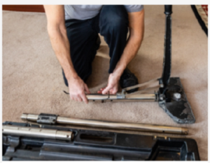 Professional carpet power stretching equipment in use